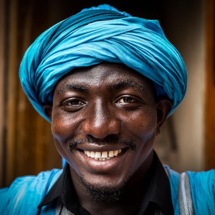 Maya Singh, Lead Design Curator at PebbleCalmDawn, reviewing corporate floral arrangements